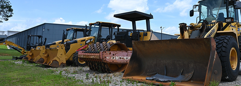 Image of tractors and backhoes