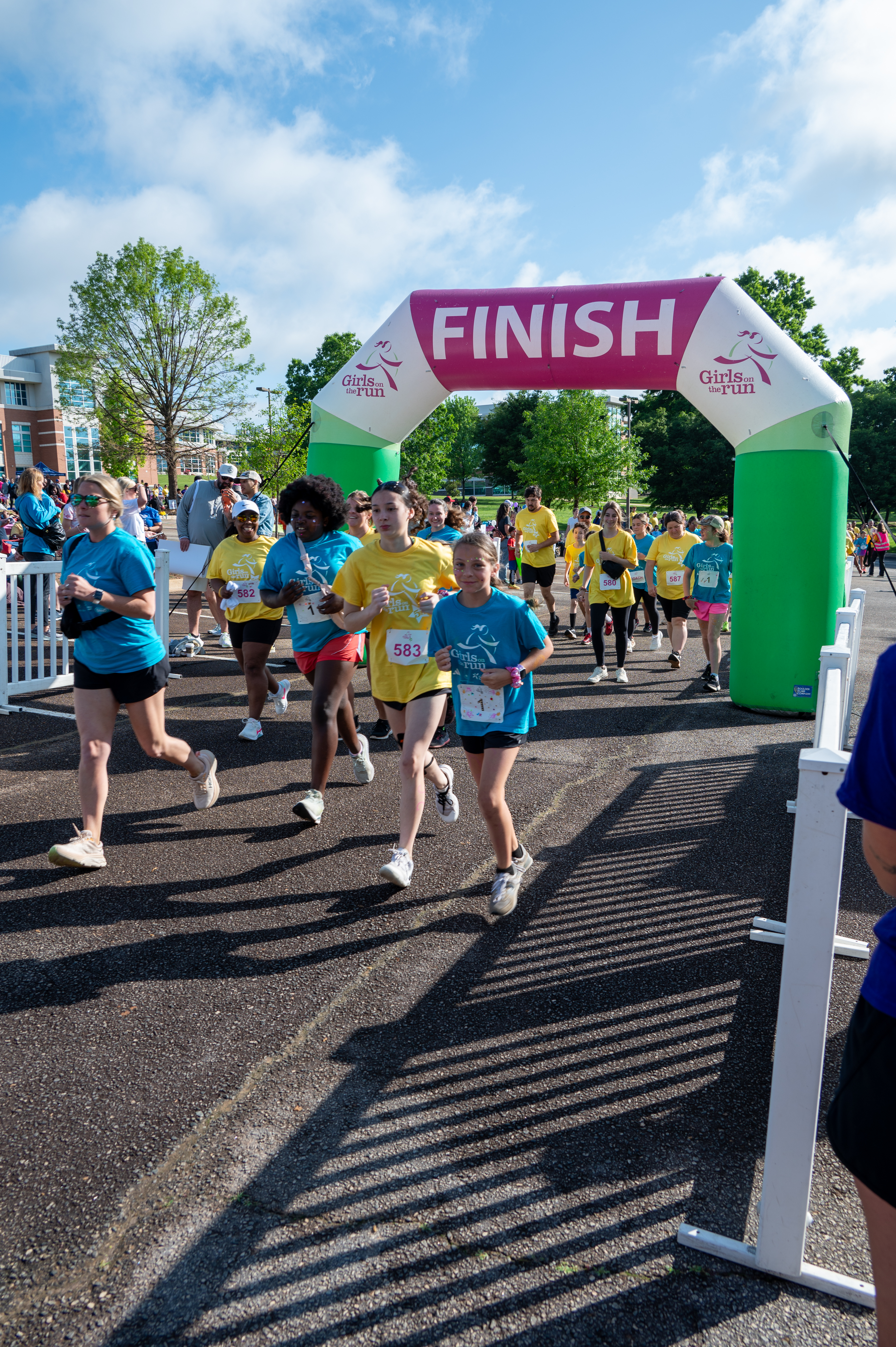 Participants race during the Girls on the Run Event
