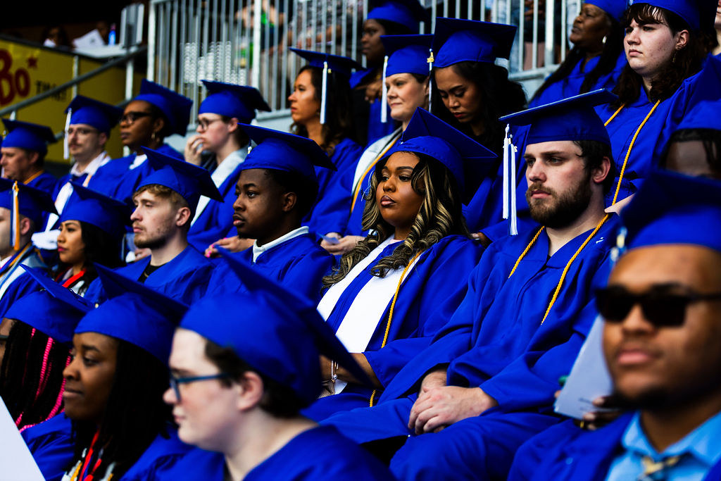 Image of SCC graduates sitting the stands