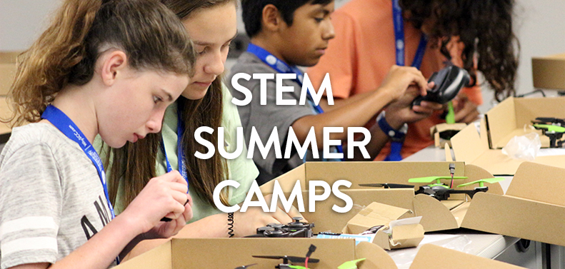 Students exploring electronics in STEM camp